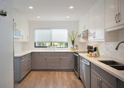 Light gray kitchen with wooden countertop photo