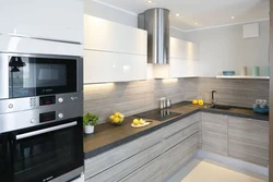 Corner kitchen photo in the interior modern design