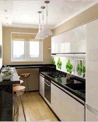 Interior of a rectangular kitchen with one window photo