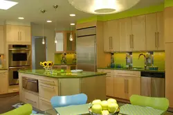 Kitchen in green color design photo