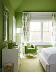 Bedroom in light green color photo