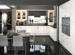 Kitchen photo with dark floor photo