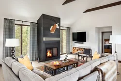 Photo of a room in an apartment with a fireplace