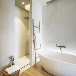 Finishing The Bathtub With Decorative Plaster Photo