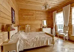 Bedroom in a log house photo