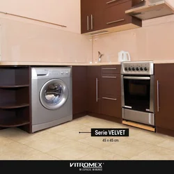 Built-in washing machine in the kitchen photo