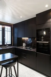 Modern kitchen design in dark colors