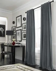 Gray curtains in the living room interior photo