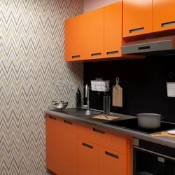 Gray wallpaper and orange kitchen photo