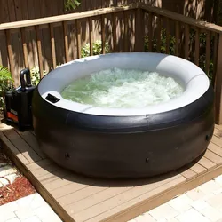 Bathtub in a summer cottage photo