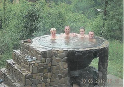 Bathtub in a summer cottage photo