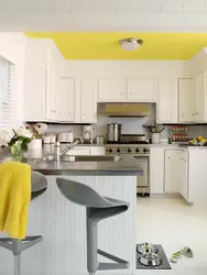 Kitchen in yellow gray colors photo