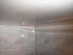 Plinth On The Ceiling In The Bathtub Photo