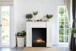 Interior with white fireplace in apartment