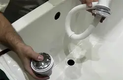 Siphon in the bathroom installation photo