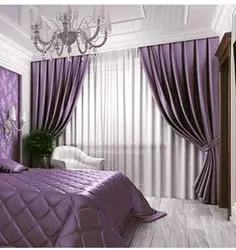 Purple curtains in the bedroom interior photo