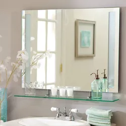 Bathroom mirror photo in the interior