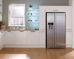 Refrigerator in the middle of the kitchen photo