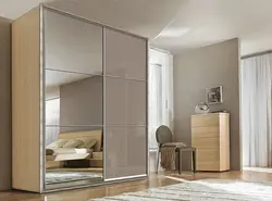 Wardrobe in the bedroom with a mirror photo