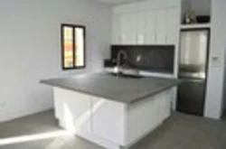 Concrete countertop in the kitchen interior photo