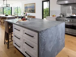 Concrete countertop in the kitchen interior photo