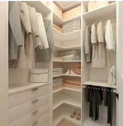 Wardrobe layout photo in the apartment