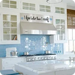 White kitchen with blue apron photo
