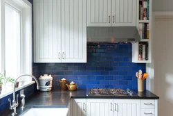 White kitchen with blue apron photo