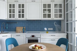 White kitchen with blue apron photo