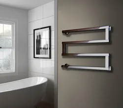 Water Heated Towel Rail For The Bathroom Photo In The Interior