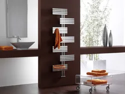 Water heated towel rail for the bathroom photo in the interior