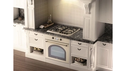 White Cooktop And Oven In The Kitchen Photo