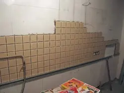Laying tiles in the kitchen photo