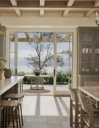 Interior kitchen living room with access to the terrace photo