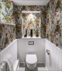Photo of renovation of a toilet in an apartment with wallpaper