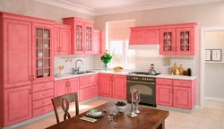 Coral-colored kitchen in the interior