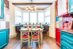 Coral-colored kitchen in the interior