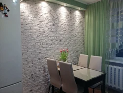 Wallpaper bricks in the kitchen in the interior