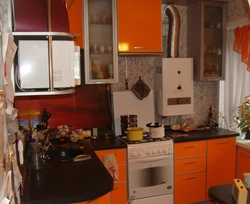 Kitchens in Khrushchev with a gas water heater and a refrigerator photo 5