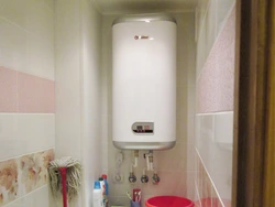 Photo Of A Bathtub With A Boiler