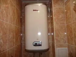 Photo of a bathtub with a boiler