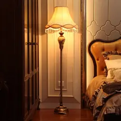 Floor lamp in the bedroom in the interior