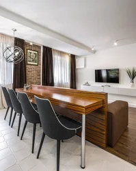 Kitchen living room design with bar counter and sofa