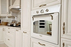 White oven in the kitchen interior