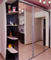 Mirrored wardrobe in the hallway design