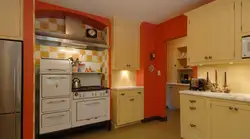 Kitchen design with orange refrigerator