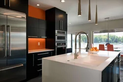 Kitchen design with orange refrigerator