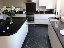 Kitchen interior with dark tiles photo