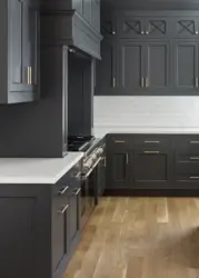Gray kitchen in the interior combination with wallpaper