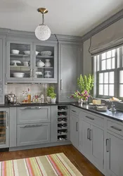 Gray kitchen in the interior combination with wallpaper